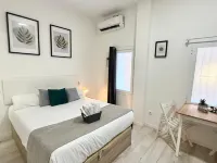 Oshun Cinco Torres Suites Hotels near Ventilla