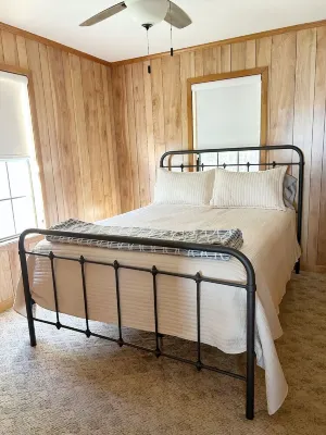 3-bedroom cabin nestled on 80 acres with WiFi, AC on private 5-acre lake.