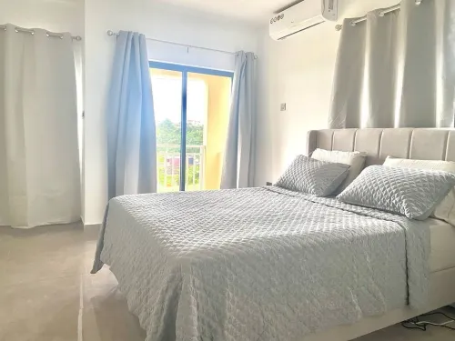 Charming 2-bedroom townhome with WiFi, fitness room in Runaway Bay