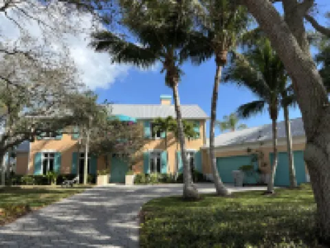 Enjoy our waterfront home with private beach access & boat dock in The Moorings! Hotels in South Beach