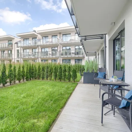 Ground floor apartment with a garden in Niechorze