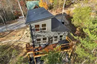 Green & Black Bear Cabins by Beyond Expectations