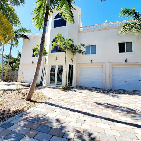 5Br Luxury Home w/ Pool, Theater, Rooftop Deck & 100-ft Dock Near Beach!