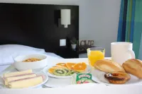 Flag Hotel Santarém - servizio colazione