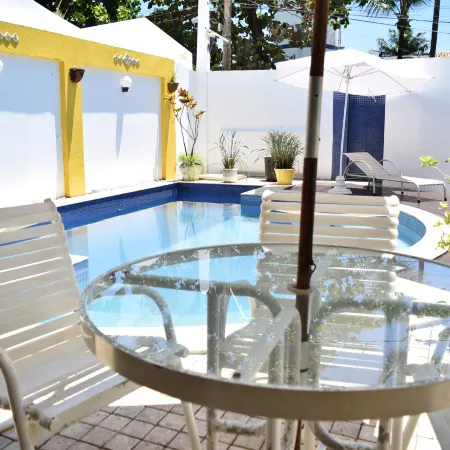 Hotel Pousada Encanto de Itapoan Отели рядом с достопримечательностью «Пляж Итапуа»