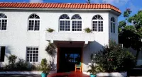 Chrisann's Beach Resort Hotels near Charles Town church of God