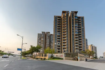 Haoke Travel  Hotel (Taihu Longzhimeng Branch) Отели рядом с достопримечательностью «Taihu Lake Longemont Paradise»