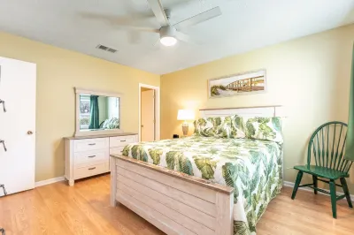 New Listing!  Ground Floor, Elegant 2 Bedroom Condo minutes from the beach.