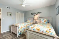 New Listing!  Ground Floor, Elegant 2 Bedroom Condo minutes from the beach.