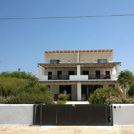 Mediterranean Beachfront Abode with Panoramic Terrace and Breathtaking Views