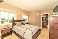 Elevator, Master Suites, Jacuzzi's -  steps to the Beach!