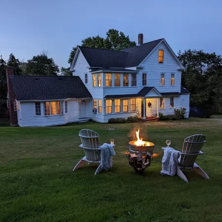 Enjoy comfortable elegance in this secluded grand home located in town