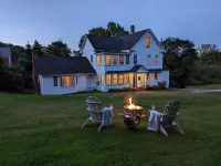 Enjoy comfortable elegance in this secluded grand home located in town