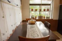 The house is in the middle of town, next to HEB with an amazing backyard.