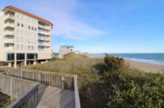 Beautiful condo with personal balcony in our oceanfront complex .