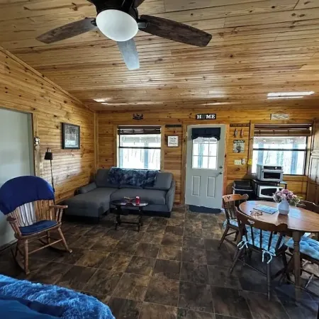 Buckeye cabin is nestled in the woods with access to the Little Missouri River.