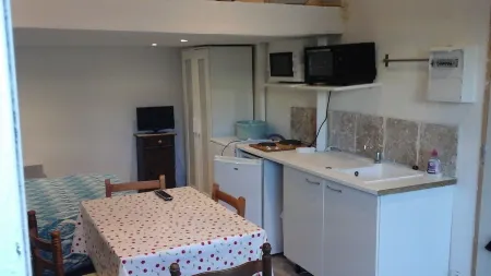 Studio with mezzanine near the port, with garden