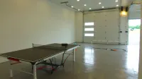Modern and Spacious with game/movie room.