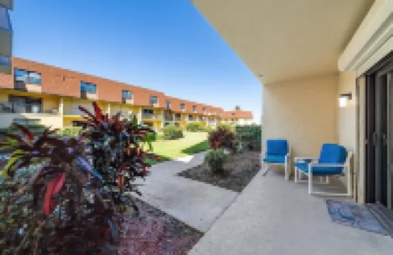 Affordable ONE BR Main Floor Condo RIGHT ON THE BEACH w/ KING Bed & Heated POOL!