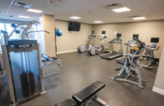 Cozy Retreat with Rooftop Pool, Parking, and Spacious Comfort