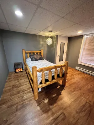 Real Log Cabin with Seasonal Pool and Hot Tub near Blue Springs Ranch