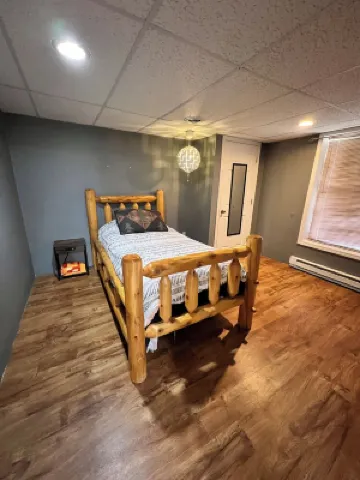 Real Log Cabin with Seasonal Pool and Hot Tub near Blue Springs Ranch