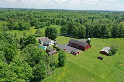 Spacious Colonial Farmhouse on 240 Acres