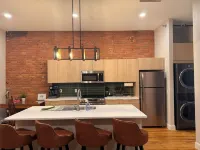 Cozy 1-Bedroom Loft in the Heart of Faribault with Arcades + Sauna & Gym Hotels in Faribault