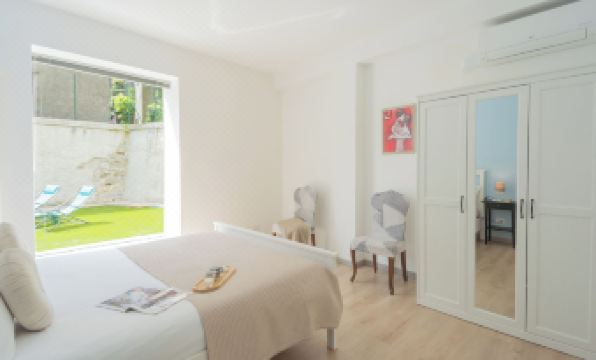 La Quiete with Private Garden by Rent All Como