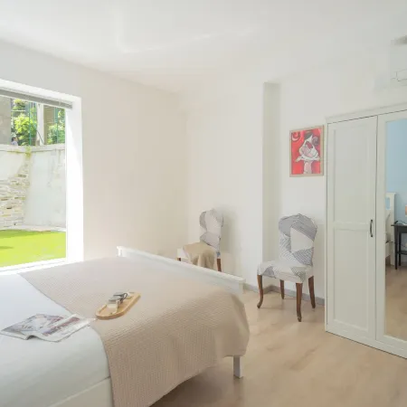 La Quiete with Private Garden by Rent All Como