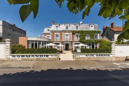 The Originals Boutique, Hôtel Normandie, Auxerre Отели в г. Валлан