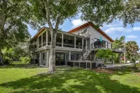 Luxe Riverfront Home on 1-Acre Lot w/ Private Dock, Hot Tub & Screened Deck Hotel di Bonita Springs