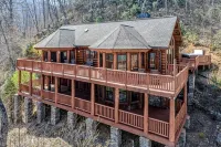 Mountain-view log home with hot tub, firepits, pool table & air hockey