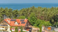 Apartamenty Sun & Snow Continental Blisko plaży Hôtels à : Krynica Morska