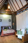 The Riverside Javanese Cottages Отели в г. Pakem