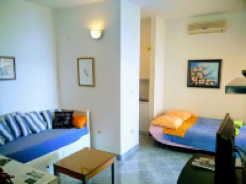 Villa Vedran apartment Vedran B with sun beds facing the sea