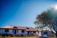 Traditional house with one bedroom apartment/ fireplace and porch.