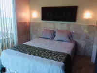 A Tranquil Tropical Retreat, Private with Personal Staff Hotels near Boat to Nuts Huts
