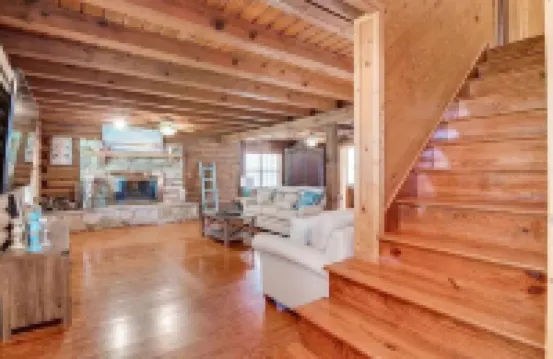 Unwind with the whole family at this serene 5-bedroom cabin retreat