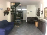 Capomulini villa with private garden, descent to the sea and seasonal swimming pool.