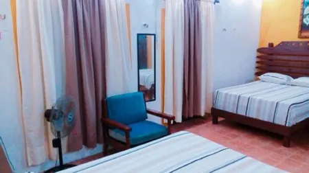 Hostal y Camping Villa Mercedes Отели рядом с достопримечательностью «CENOTE KIKIL»