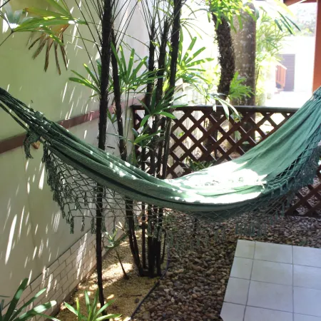 Hotel Ilhas do Caribe - Na Melhor região da Praia da Enseada Отели рядом с достопримечательностью «Пляж Энсеада»