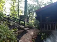 Red Bend cabin overlooking the river with hot tub.