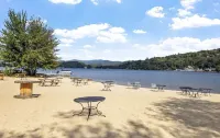 Modern family-friendly home with private beach access on Newfound Lake