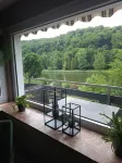 Modern vacation apartment Fuldaliebe with balcony, idyllic on the river, cycle path Fulda+Weser