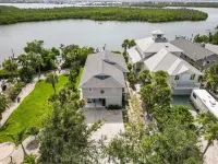 Private Bayfront Beach House w/ Dock & Spa, Steps to Beach and Restaurants