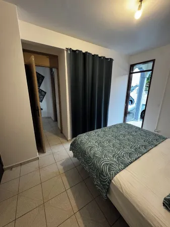 Comfortable family home between waterfalls and heavenly beaches