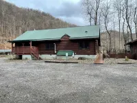 Fall Foliage Riverfront Cabin w/Hot Tub, King Bed, EV & Firepit & Mountain Views