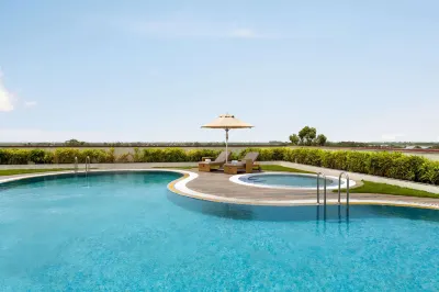 Ramada by Wyndham Aligarh GT Road Hôtels à : Sikandarpur Bhukarawale