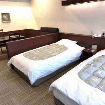 千年の湯古まん Rooms